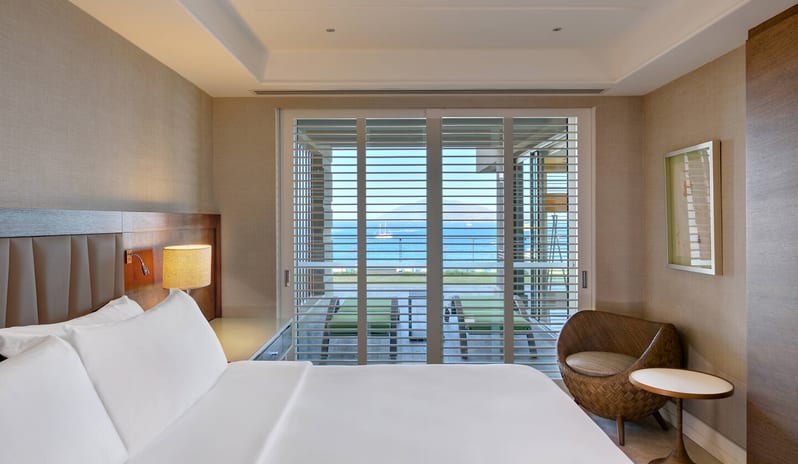 CARESSE HOTEL - TWO BEDROOM SUITE MASTER BEDROOM